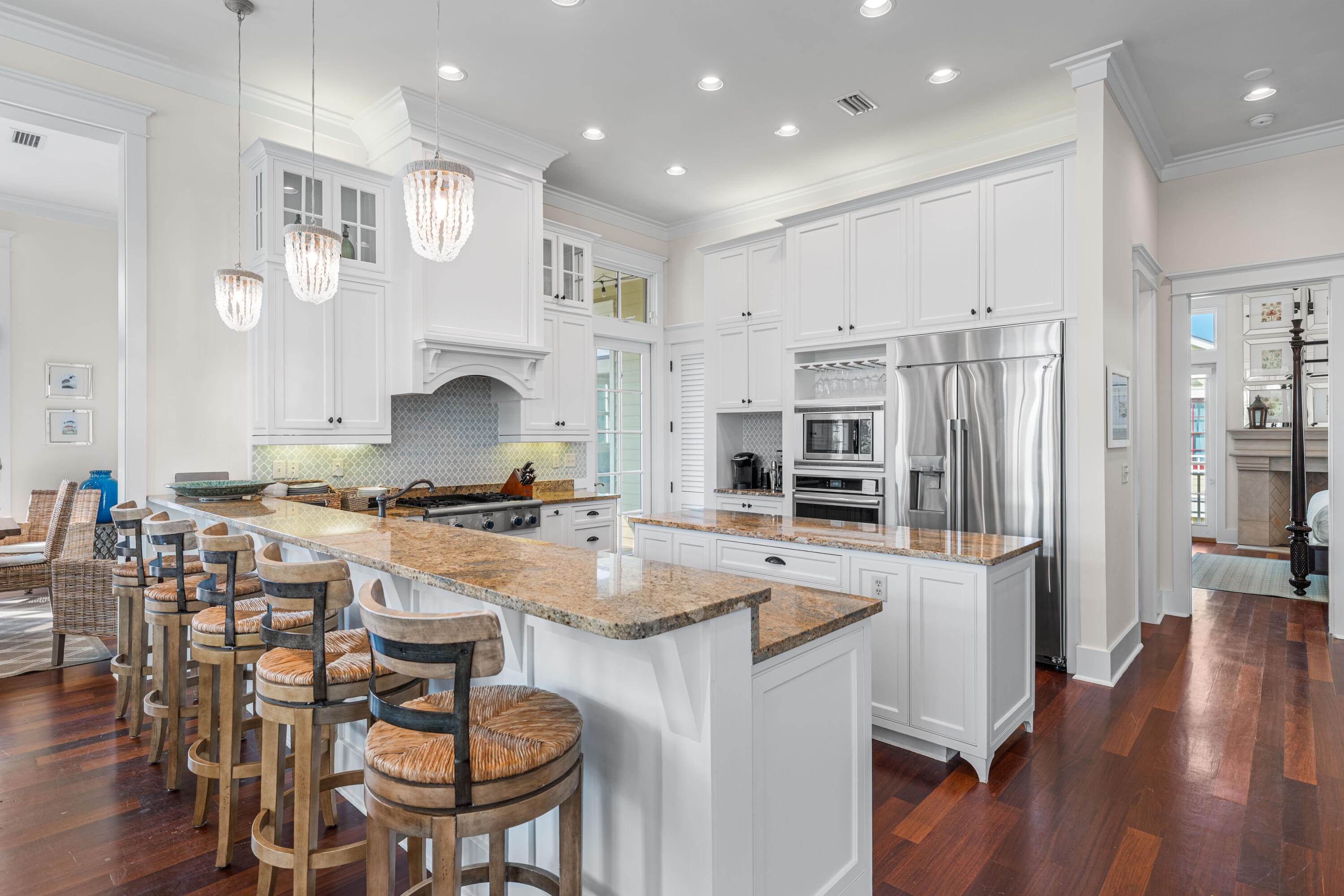 81 Western Lake Drive Santa Rosa Beach, FL 32459 - Photo 22 of 89 a large kitchen with a table and chairs