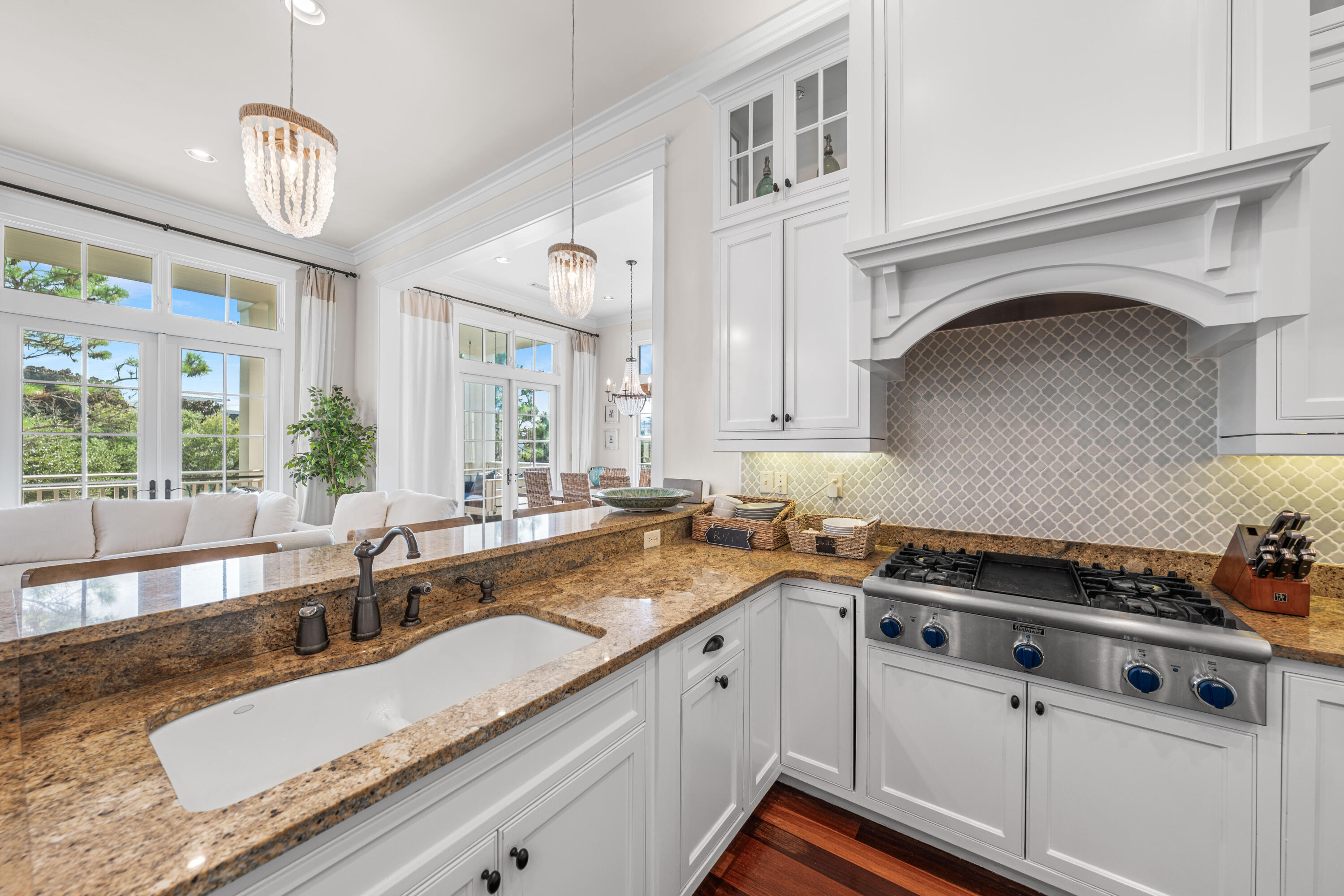 81 Western Lake Drive Santa Rosa Beach, FL 32459 - Photo 23 of 89 a kitchen that has a lot of cabinets in it