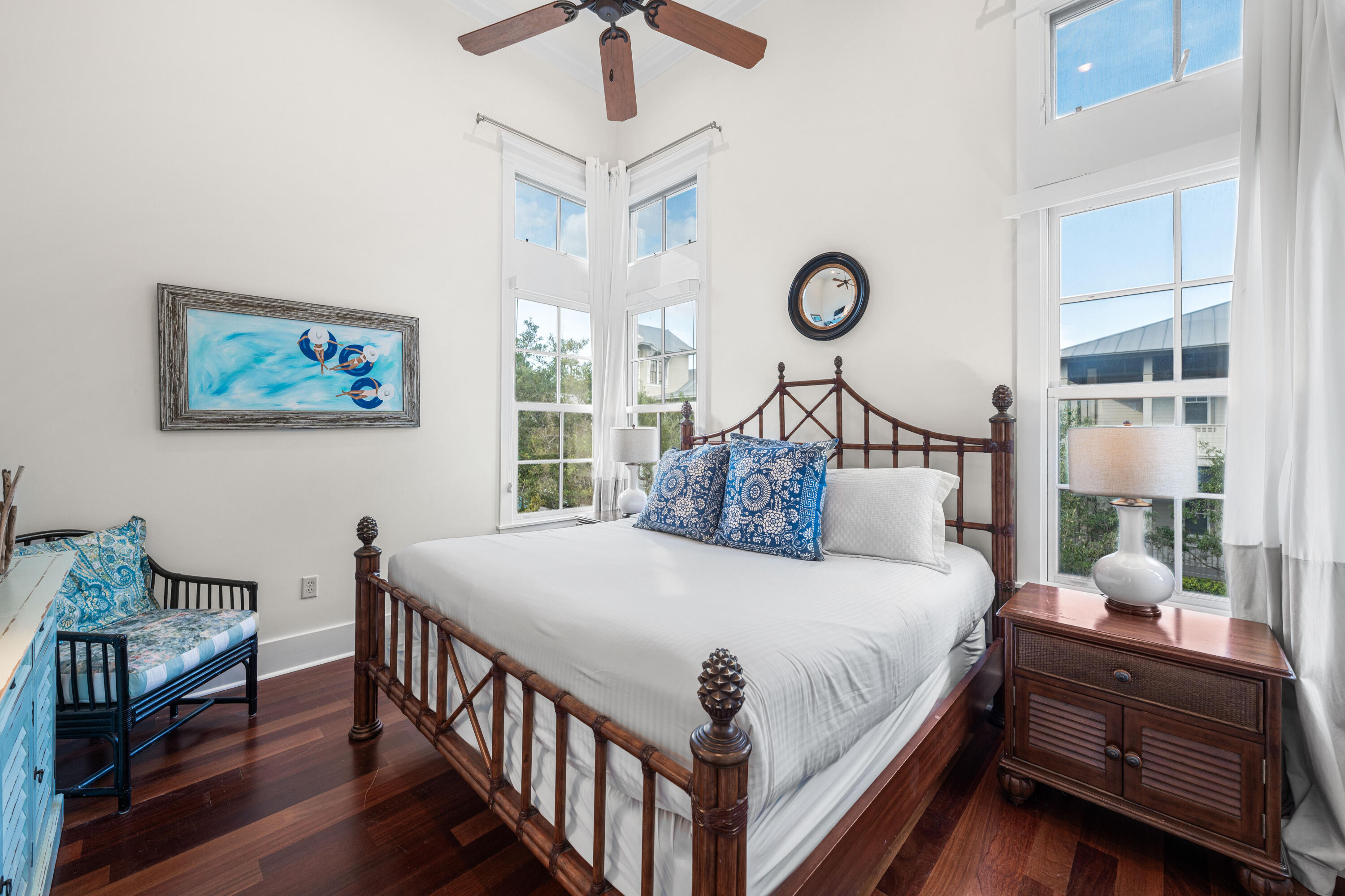 81 Western Lake Drive Santa Rosa Beach, FL 32459 - Photo 68 of 89 a bedroom with a bed a chandelier and a window