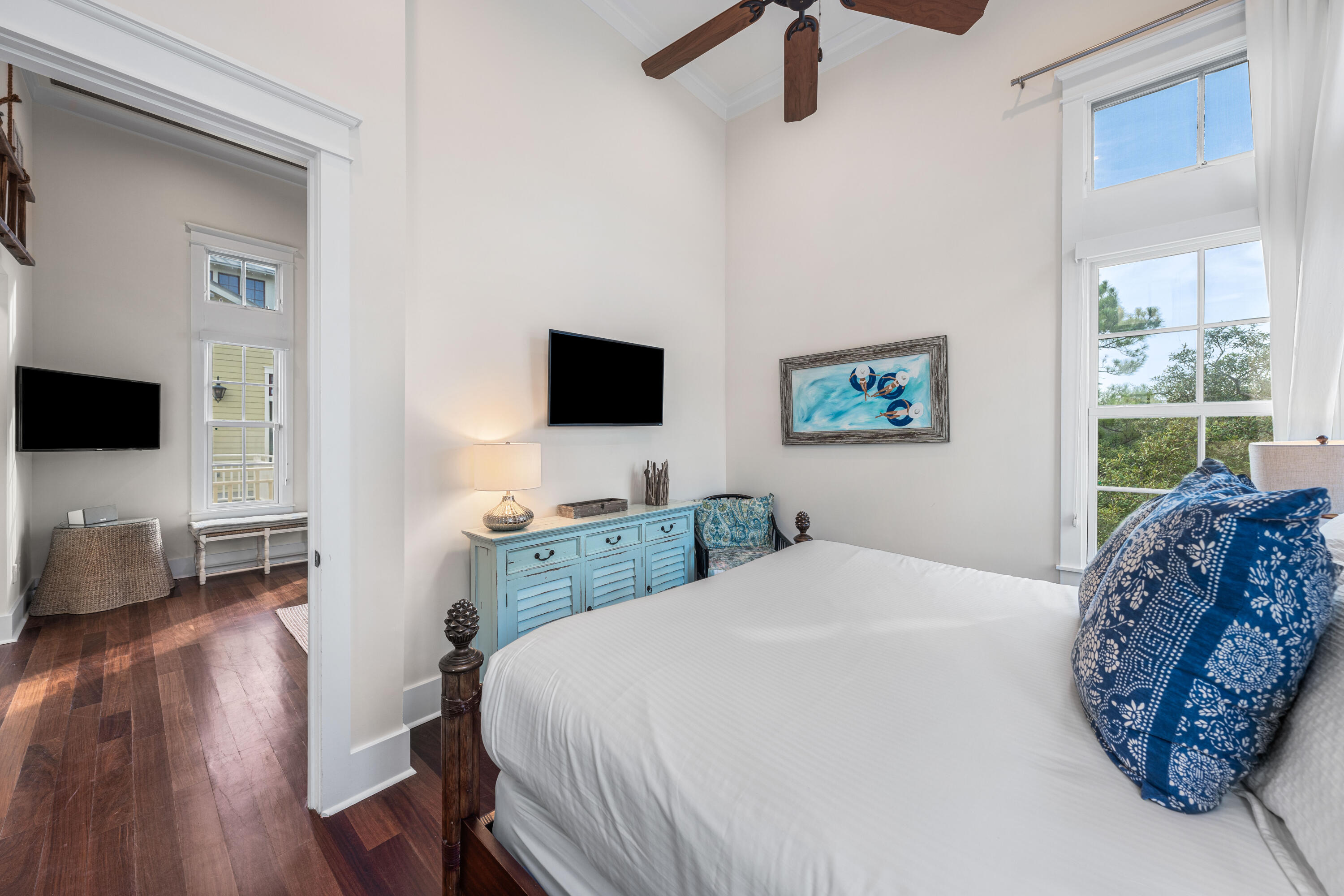81 Western Lake Drive Santa Rosa Beach, FL 32459 - Photo 69 of 89 a spacious bedroom with a bed and a flat screen television