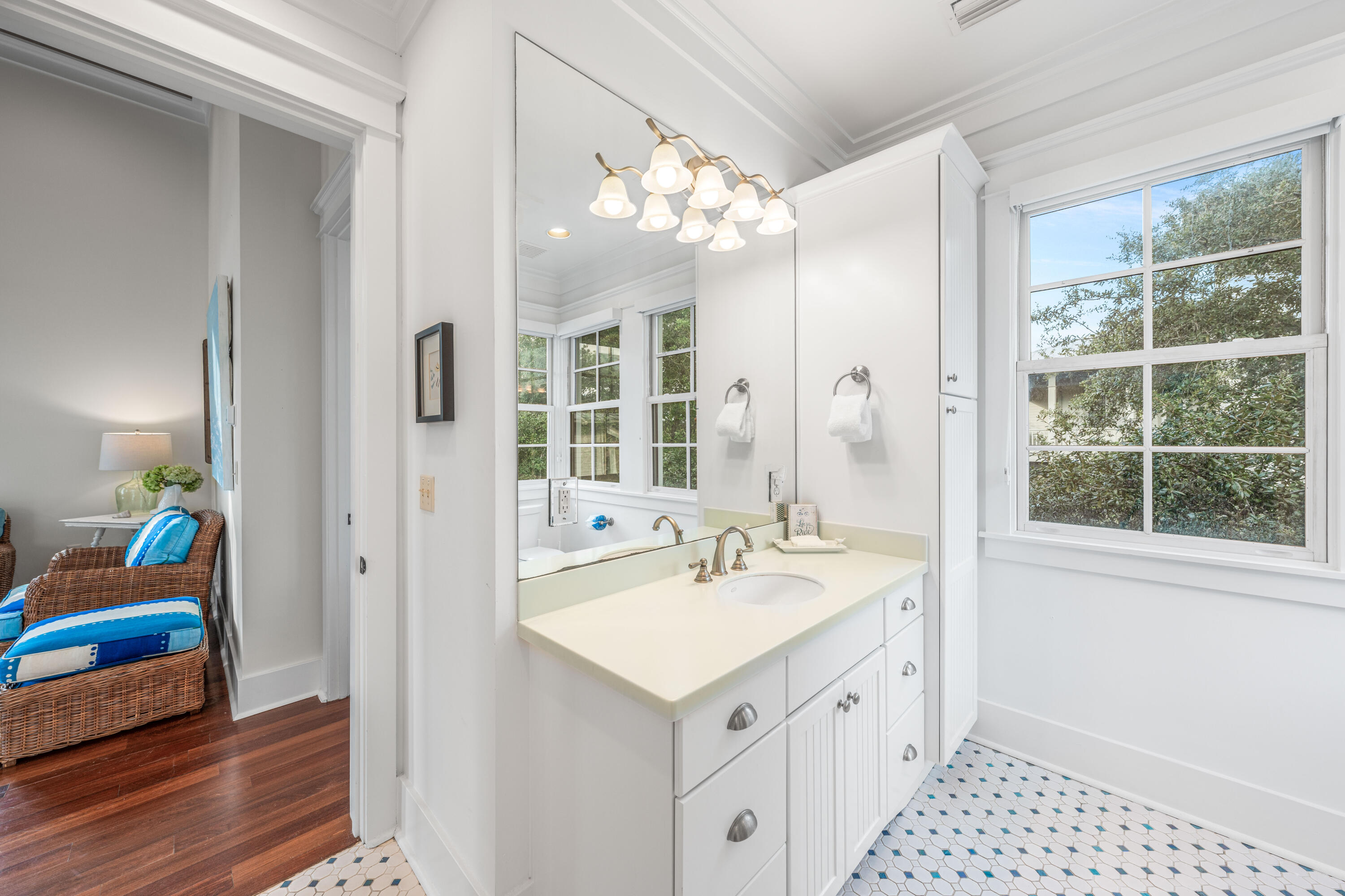 81 Western Lake Drive Santa Rosa Beach, FL 32459 - Photo 72 of 89 a spacious bathroom with a sink a large mirror and a shower