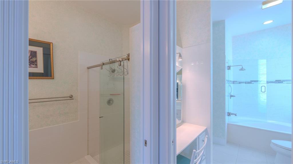 3766 Whidbey Way Naples, FL 34119 - Photo 19 of 50 Full bathroom featuring vanity and tile patterned floors