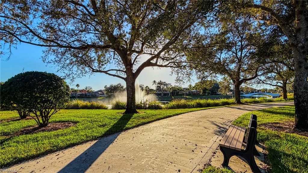 3766 Whidbey Way Naples, FL 34119 - Photo 48 of 50 Surrounding community with a yard and a water view