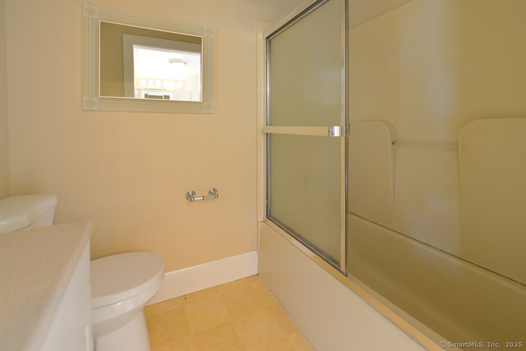 124 Purchase Brook Road Southbury, CT 06488 - Photo 18 of 26 a bathroom with a tub and shower