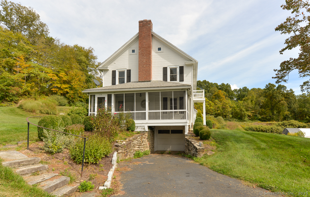 124 Purchase Brook Road Southbury, CT 06488 - Photo 21 of 26 a front view of a house with a yard