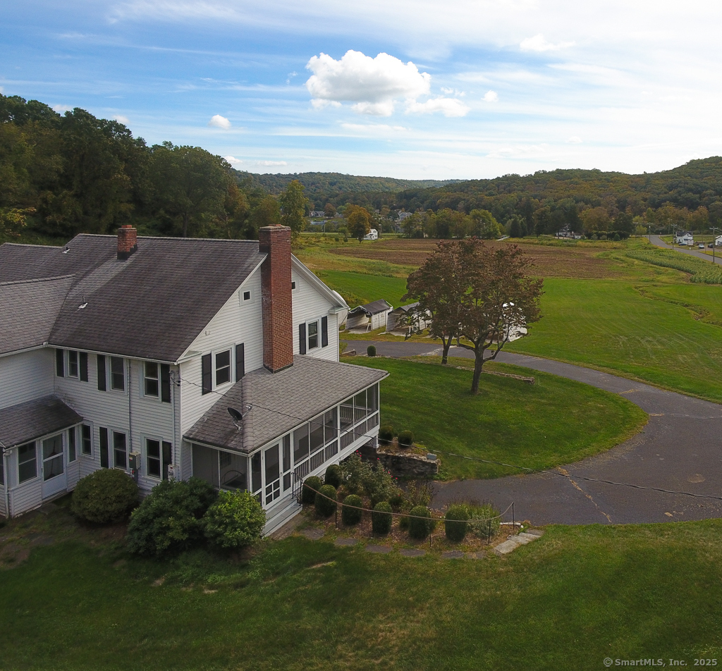 124 Purchase Brook Road Southbury, CT 06488 - Photo 25 of 26 an aerial view of residential house with outdoor space and lake view in back
