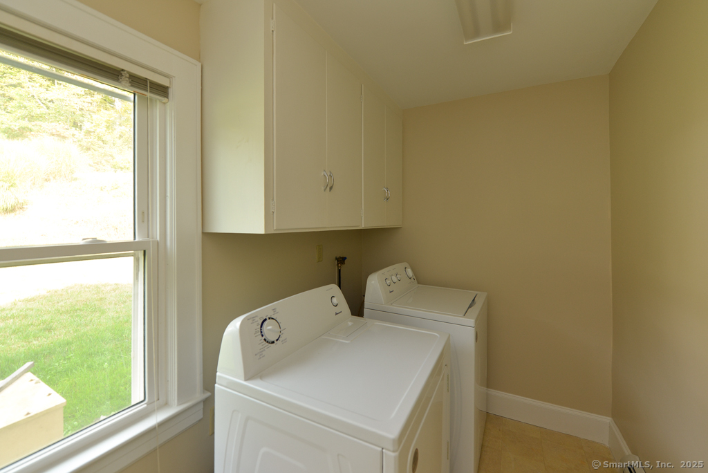 124 Purchase Brook Road Southbury, CT 06488 - Photo 6 of 26 a utility room with dryer and washer