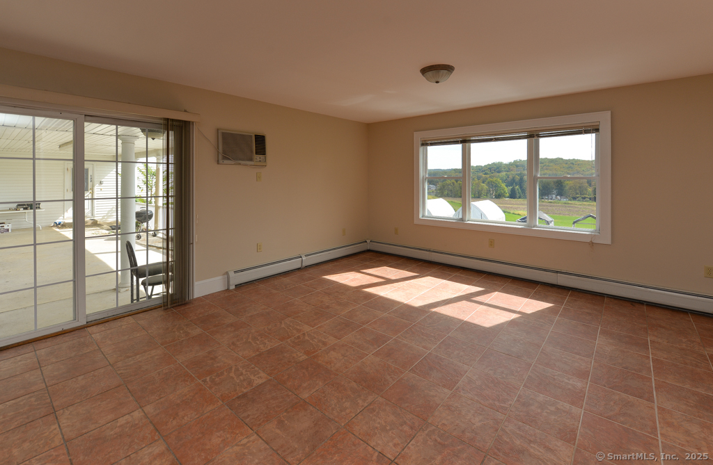 124 Purchase Brook Road Southbury, CT 06488 - Photo 9 of 26 a view of empty room with window