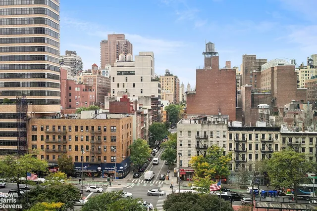a view of a city with tall buildings