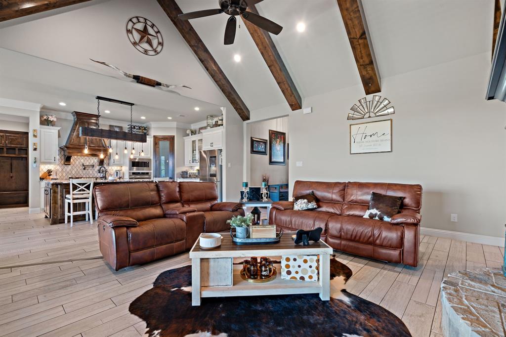 3032 Perkins Weatherford, TX 76088 - Photo 11 of 40 a living room with furniture and wooden floor