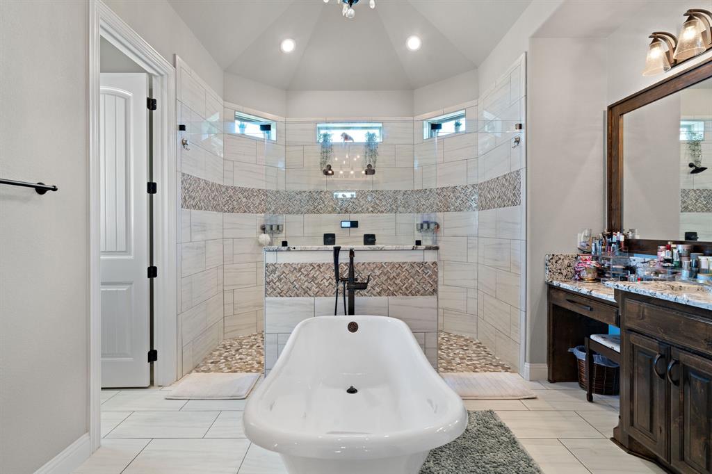 3032 Perkins Weatherford, TX 76088 - Photo 29 of 40 a bathroom with a sink and a mirror