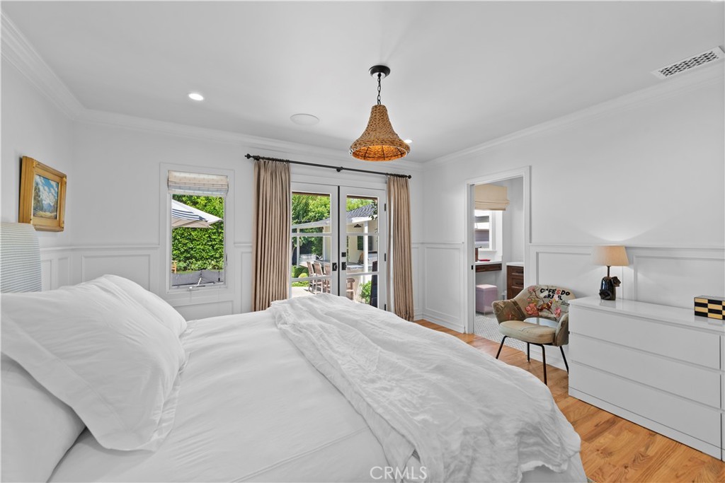 320 Broadway Costa Mesa, CA 92627 - Photo 11 of 53 a bedroom with a bed and a large window