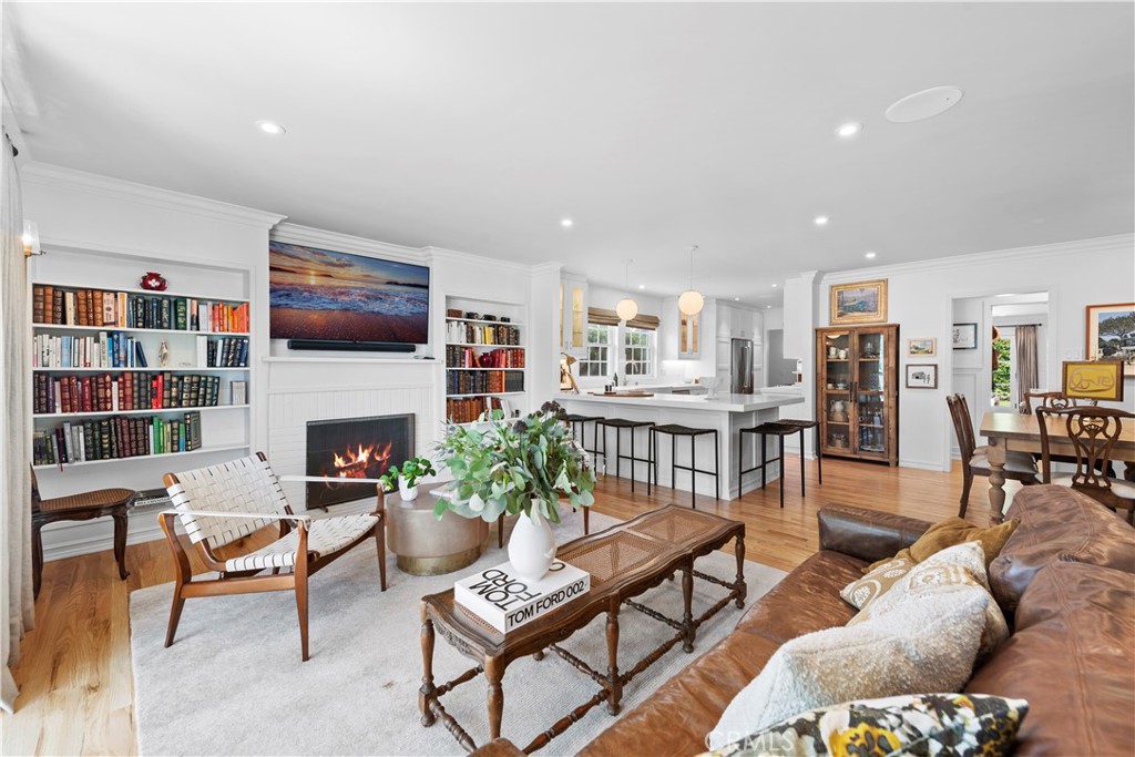 320 Broadway Costa Mesa, CA 92627 - Photo 19 of 53 a living room with furniture and a fireplace