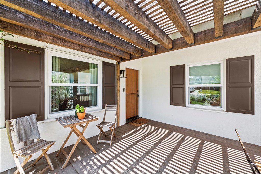 320 Broadway Costa Mesa, CA 92627 - Photo 5 of 53 a view of a patio with table and chairs and potted plants