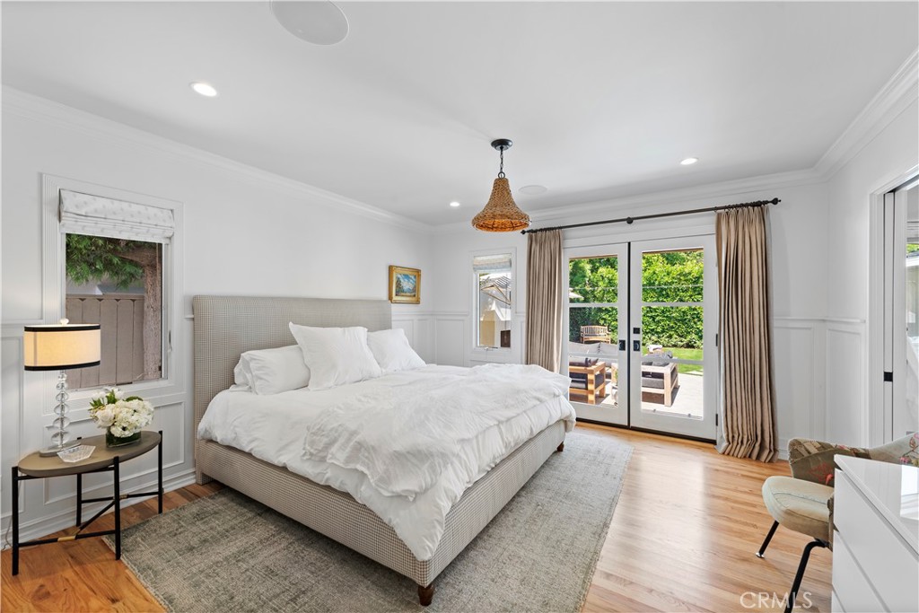 320 Broadway Costa Mesa, CA 92627 - Photo 10 of 53 a bedroom with a large bed and a large window