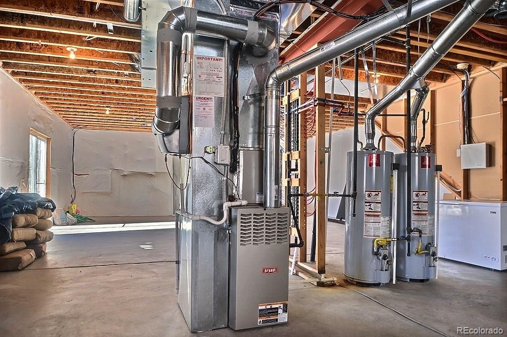 17874 West 77th Lane Arvada, CO 80007 - Photo 32 of 33 a view of walk in closet