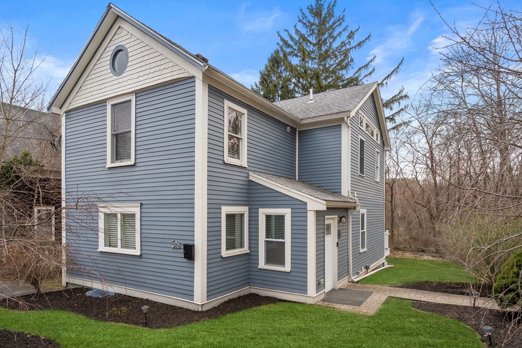 518 Maple Street Danvers, MA 01923 - Photo 14 of 20 a view of a house with a yard