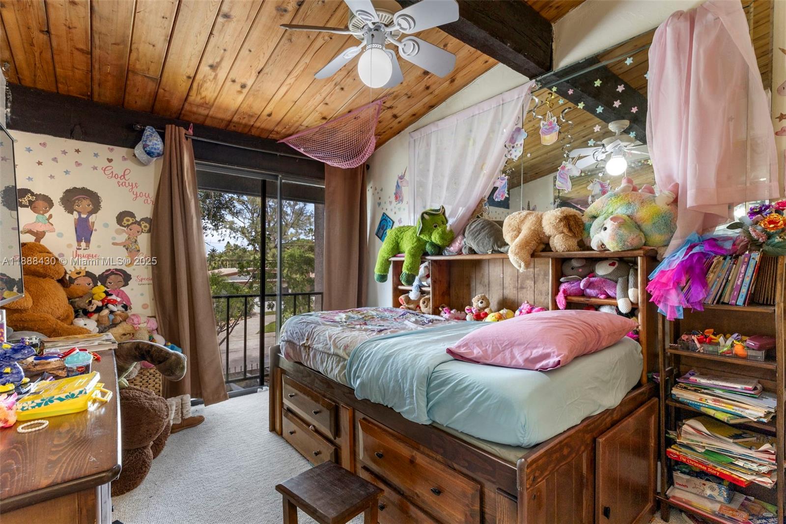 19440 Northeast 26th Avenue, Unit 53B Miami, FL 33180 - Photo 20 of 33 a bedroom with a bed and a window