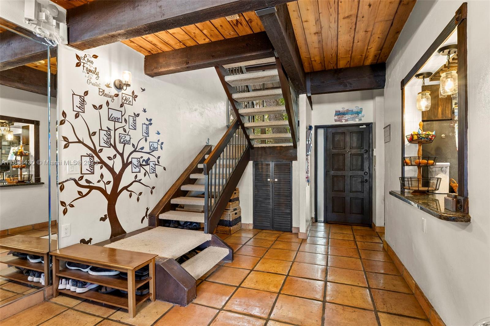 19440 Northeast 26th Avenue, Unit 53B Miami, FL 33180 - Photo 2 of 33 a view of entryway with a front door