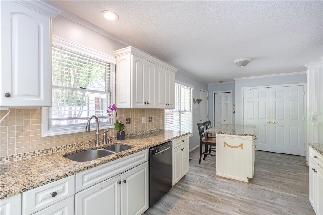 151 Hannah Circle Anderson, SC 29621 - Photo 14 of 46 This bright kitchen features ample cabinetry and a functional layout, perfect for daily living and entertaining.