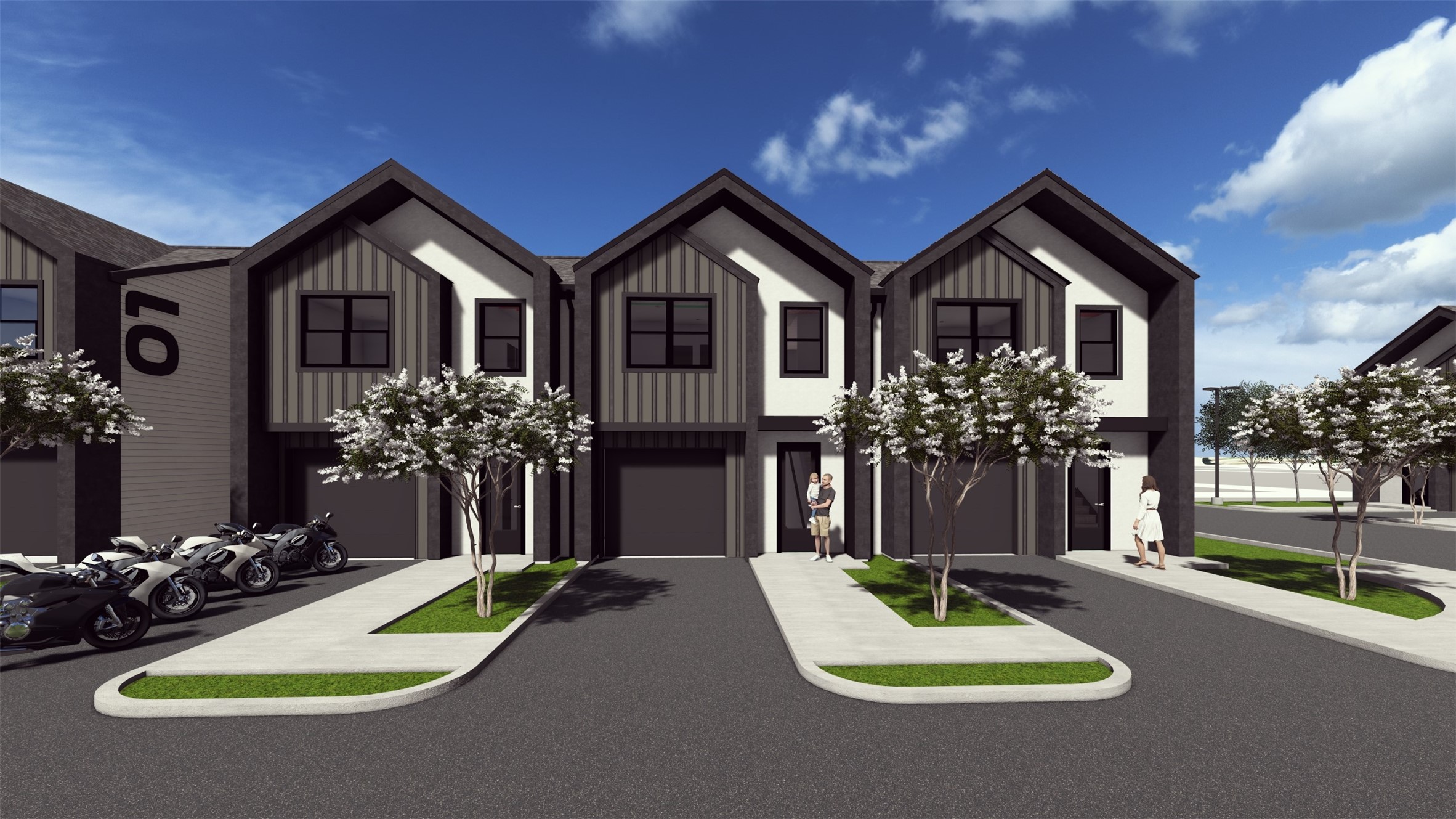 a front view of a house with yard and green space