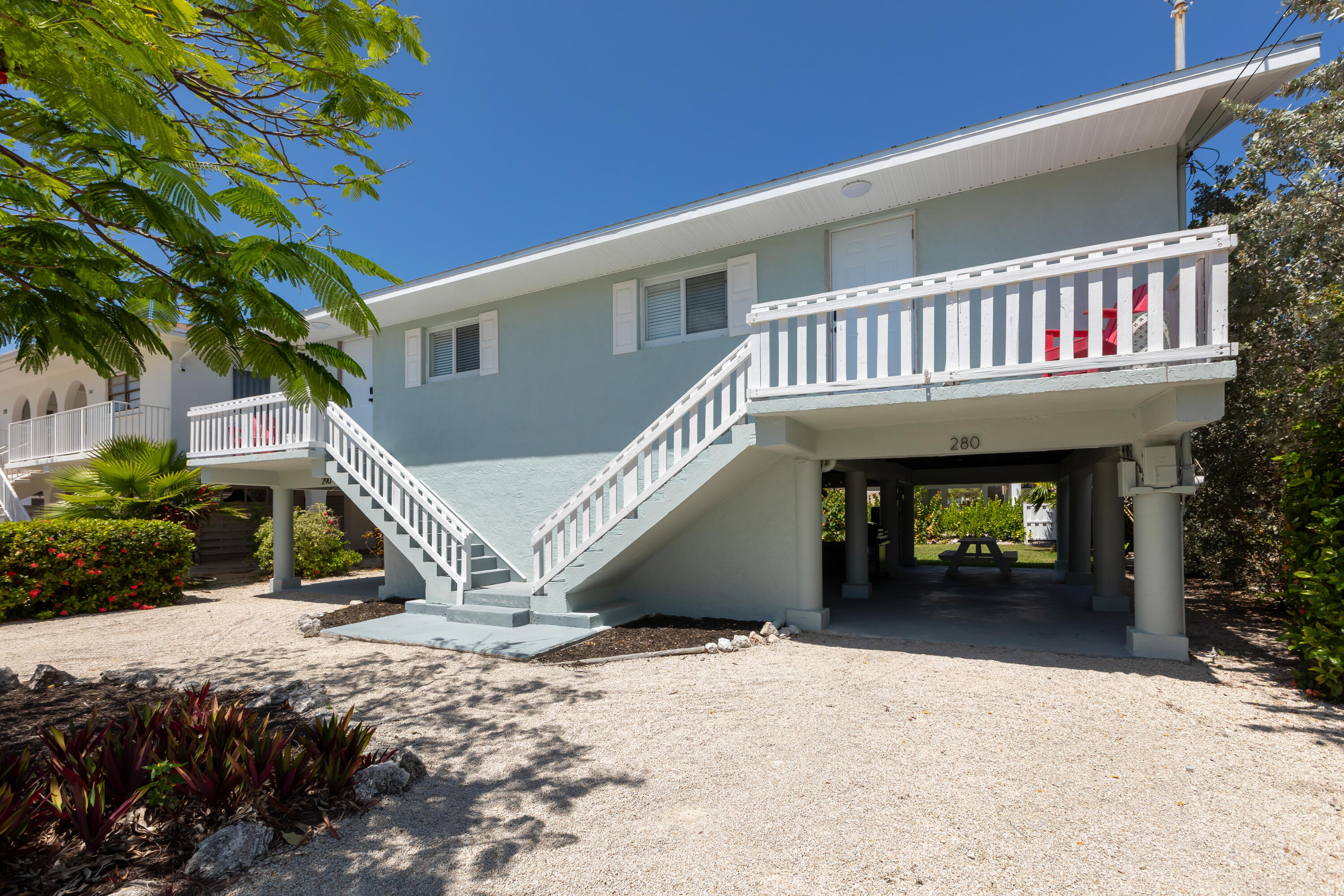 280-290 3rd Street Key Colony Beach, FL 33051 - Photo 1 of 28 a view of outdoor space and deck