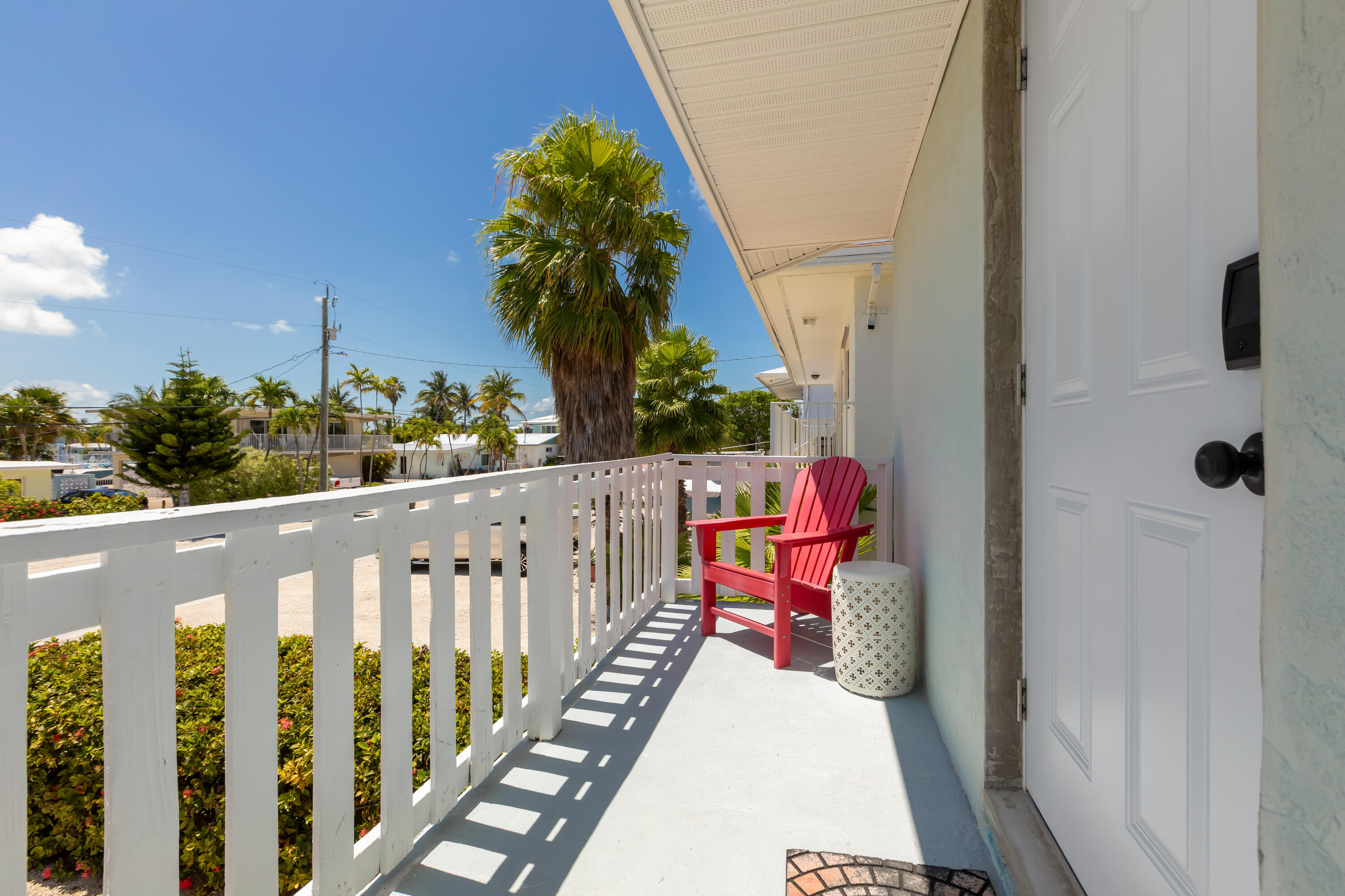280-290 3rd Street Key Colony Beach, FL 33051 - Photo 17 of 28 a balcony with view of car parked