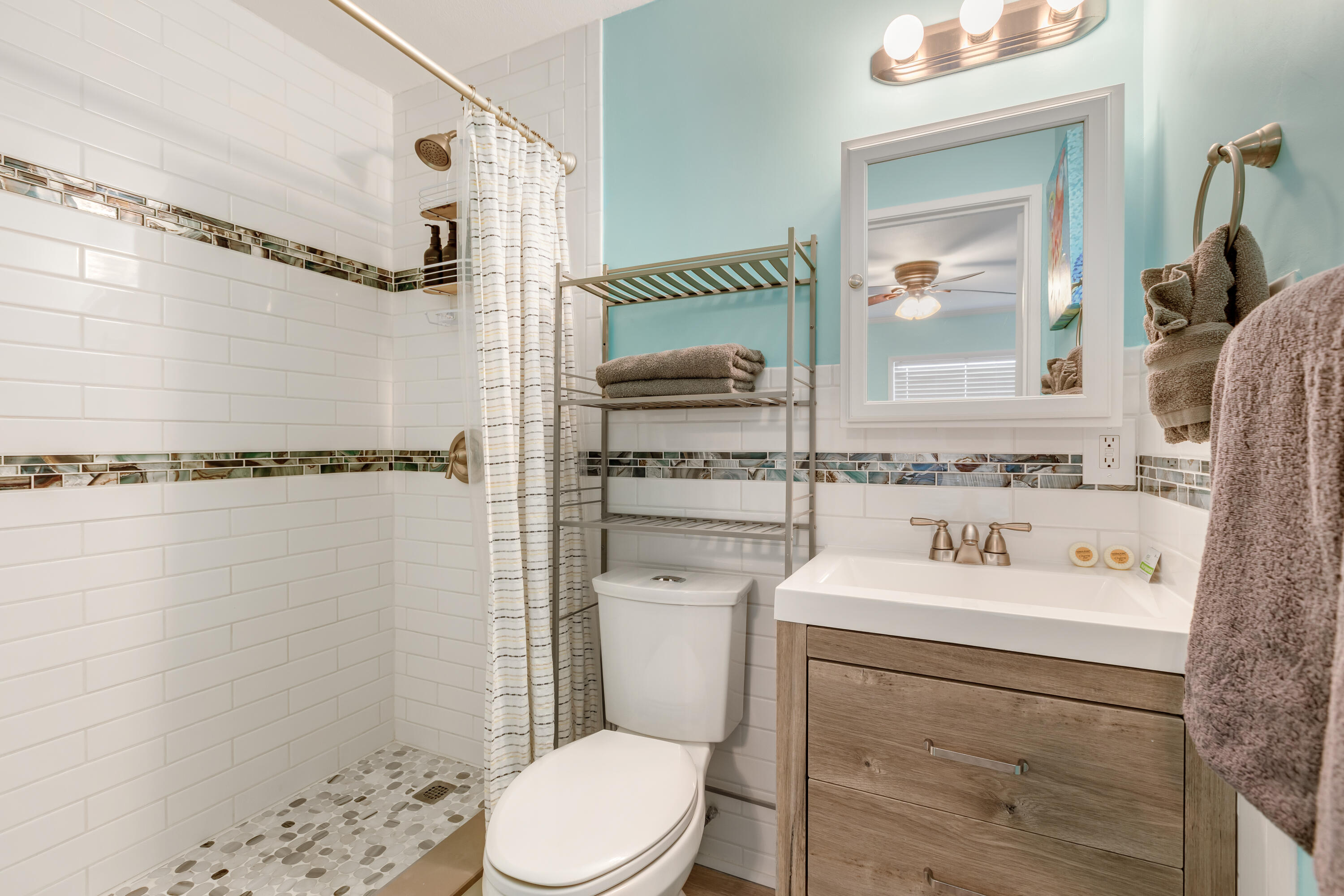 280-290 3rd Street Key Colony Beach, FL 33051 - Photo 22 of 28 a bathroom with a sink toilet and shower