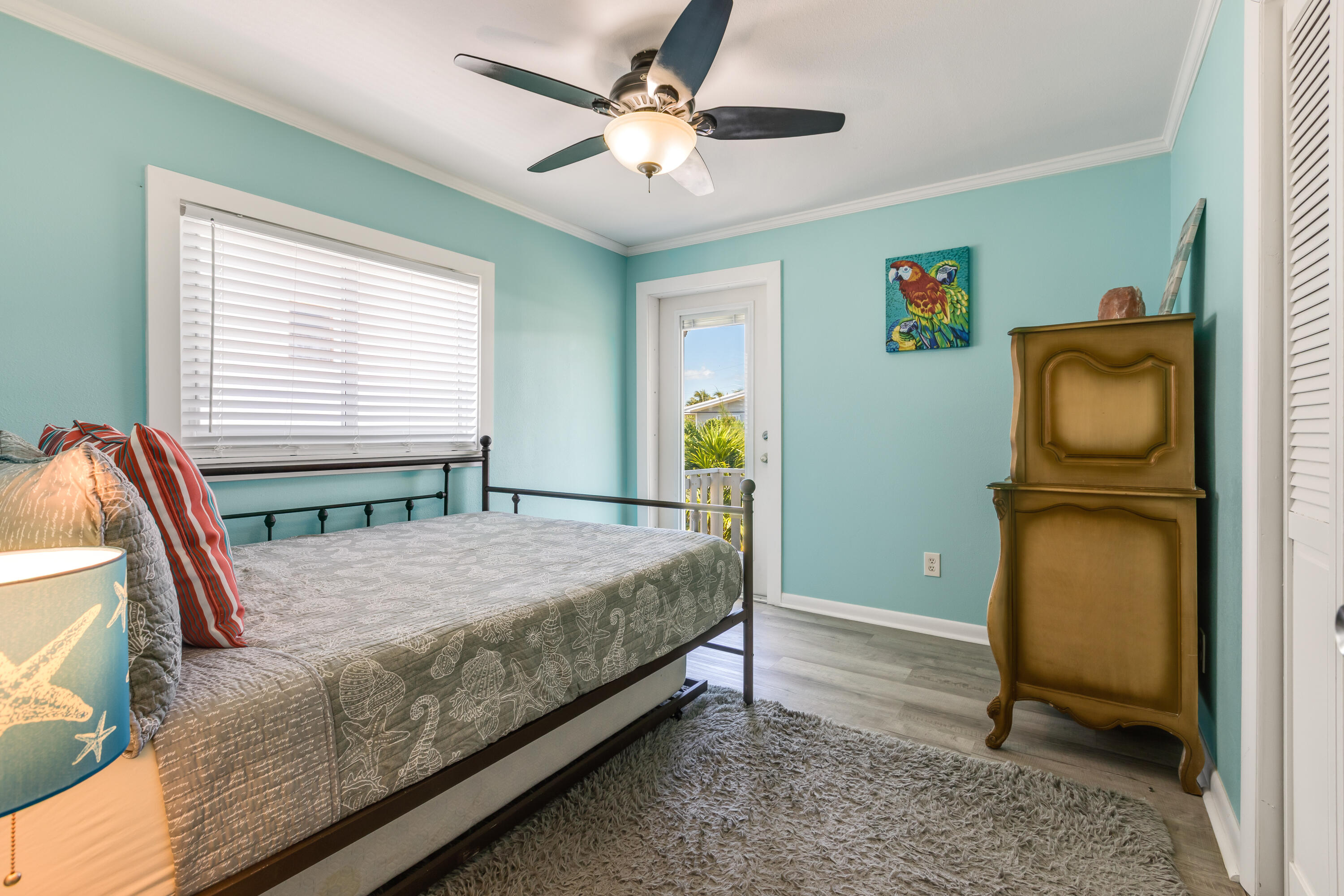 280-290 3rd Street Key Colony Beach, FL 33051 - Photo 23 of 28 a bedroom with a bed dresser and a window