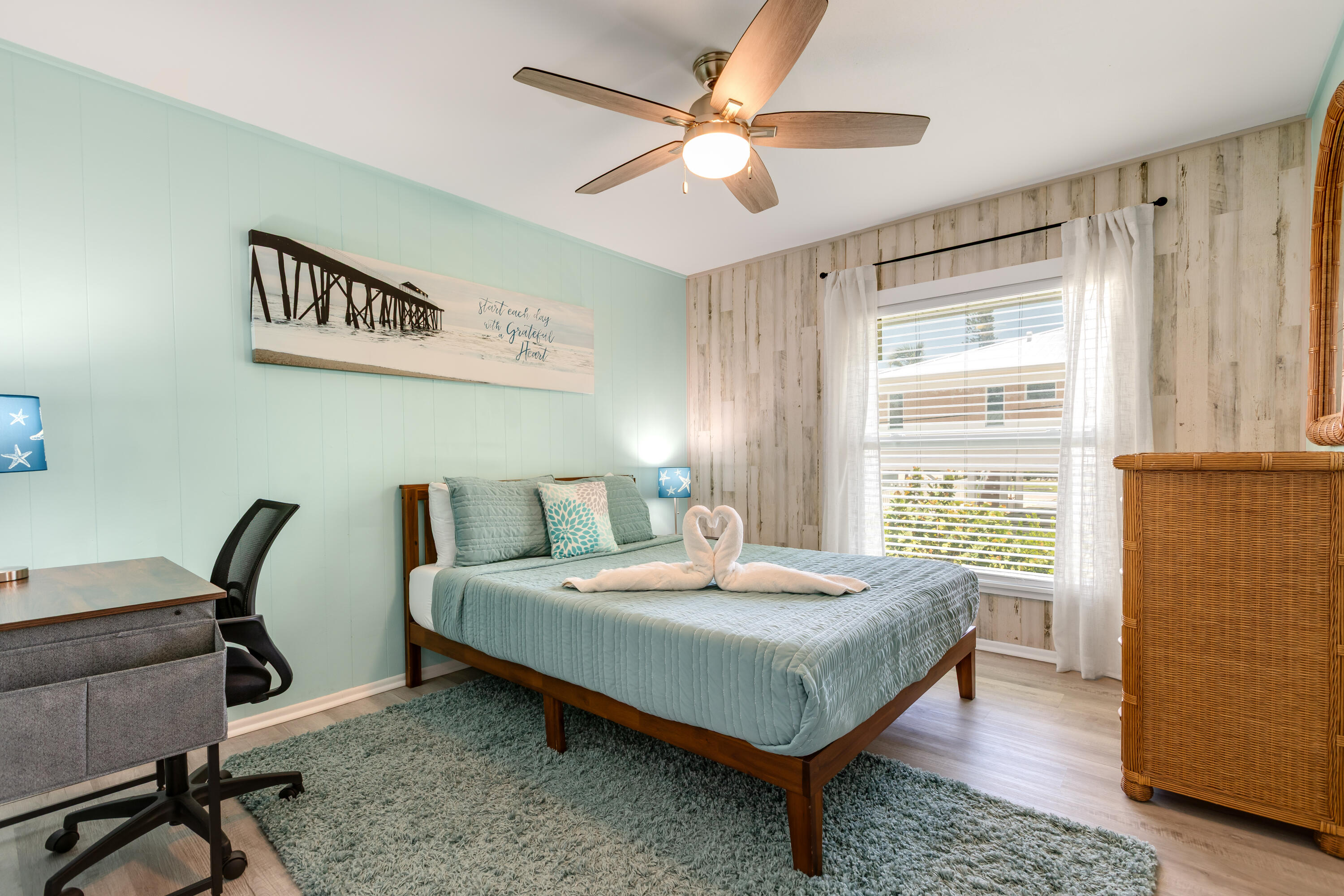 280-290 3rd Street Key Colony Beach, FL 33051 - Photo 6 of 28 a bedroom with a bed a table and chair