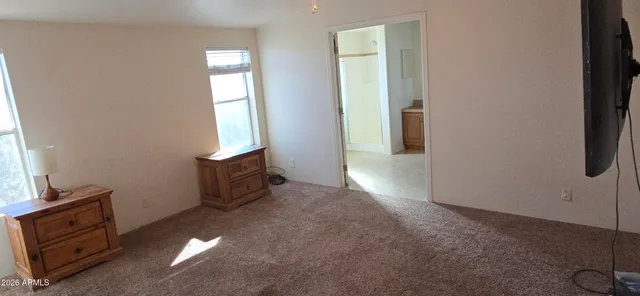 an empty room with windows