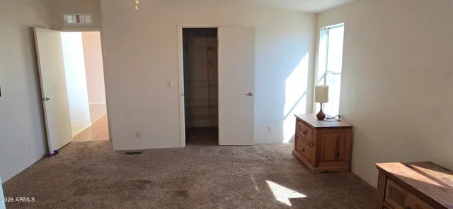 a view of an empty room and window