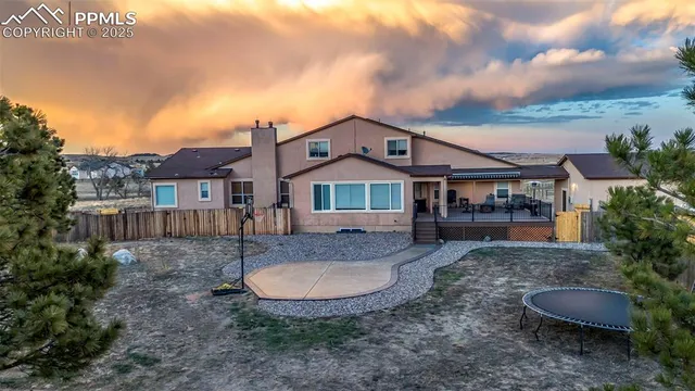 a view of a big yard next to a house