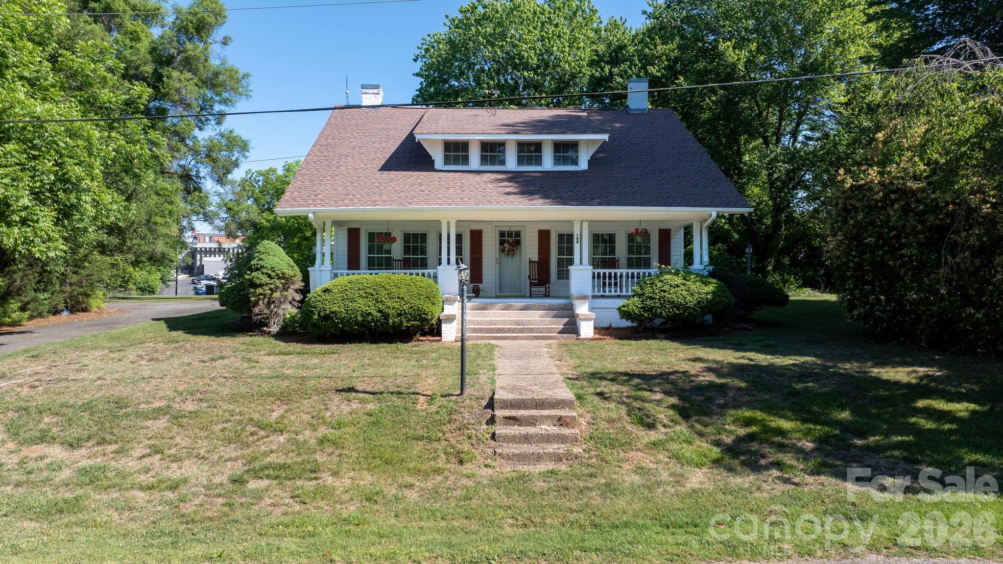 144 Hunter Bridge Road Stony Point, NC 28678 - Photo 29 of 45 a front view of a house with a yard