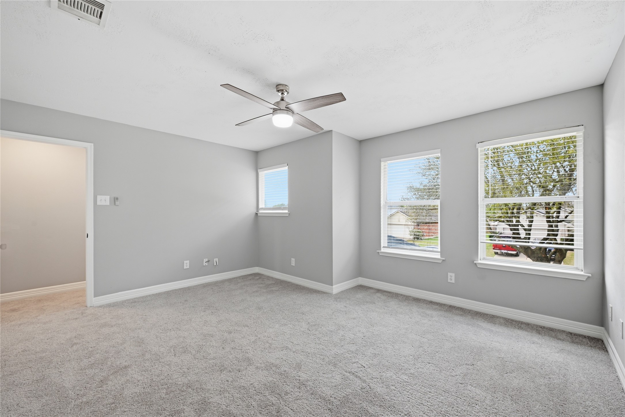 7218 Kransburg Ranch Drive Cypress, TX 77433 - Photo 17 of 27 a view of an empty room with a window