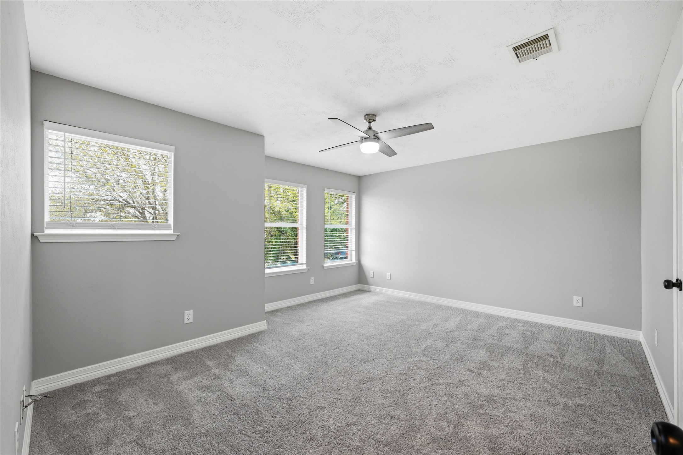 7218 Kransburg Ranch Drive Cypress, TX 77433 - Photo 18 of 27 a view of an empty room with a window