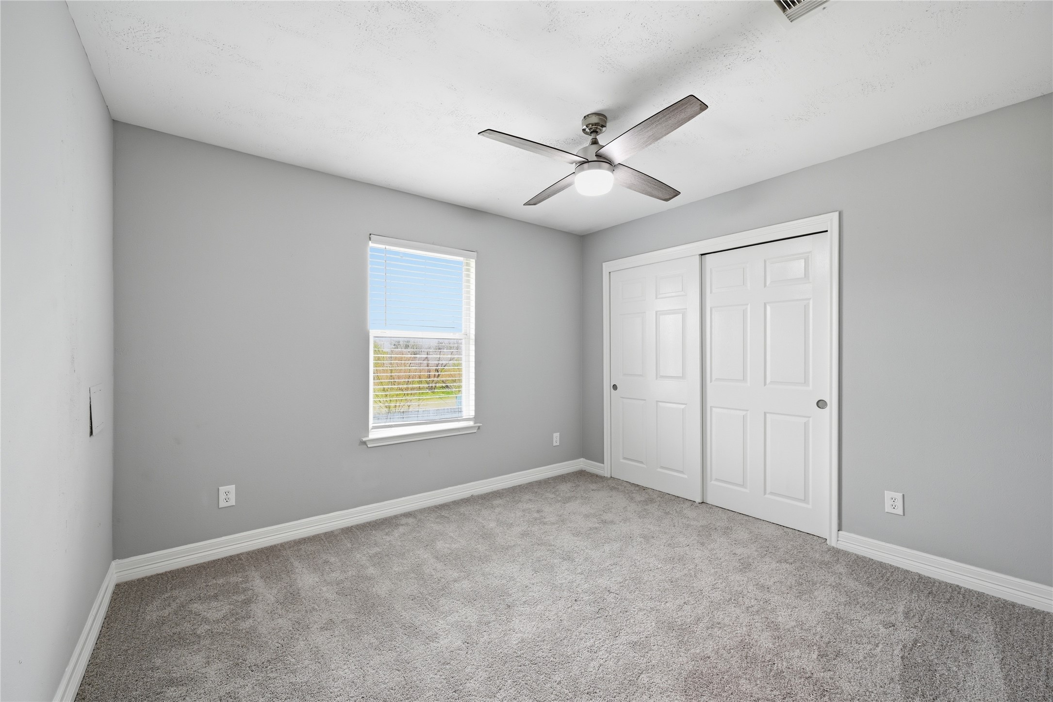7218 Kransburg Ranch Drive Cypress, TX 77433 - Photo 22 of 27 a view of an empty room with a window