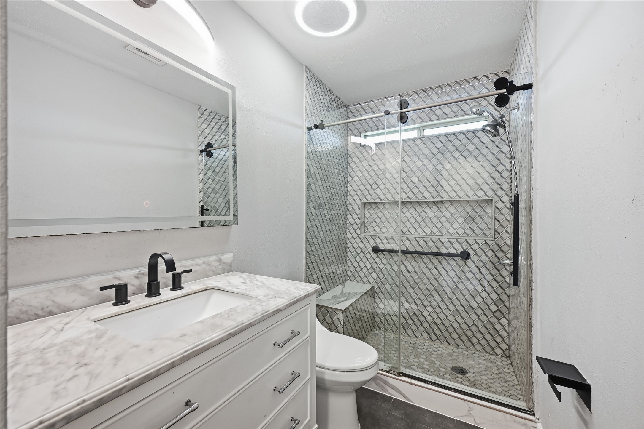 7218 Kransburg Ranch Drive Cypress, TX 77433 - Photo 23 of 27 a bathroom with a sink toilet and shower