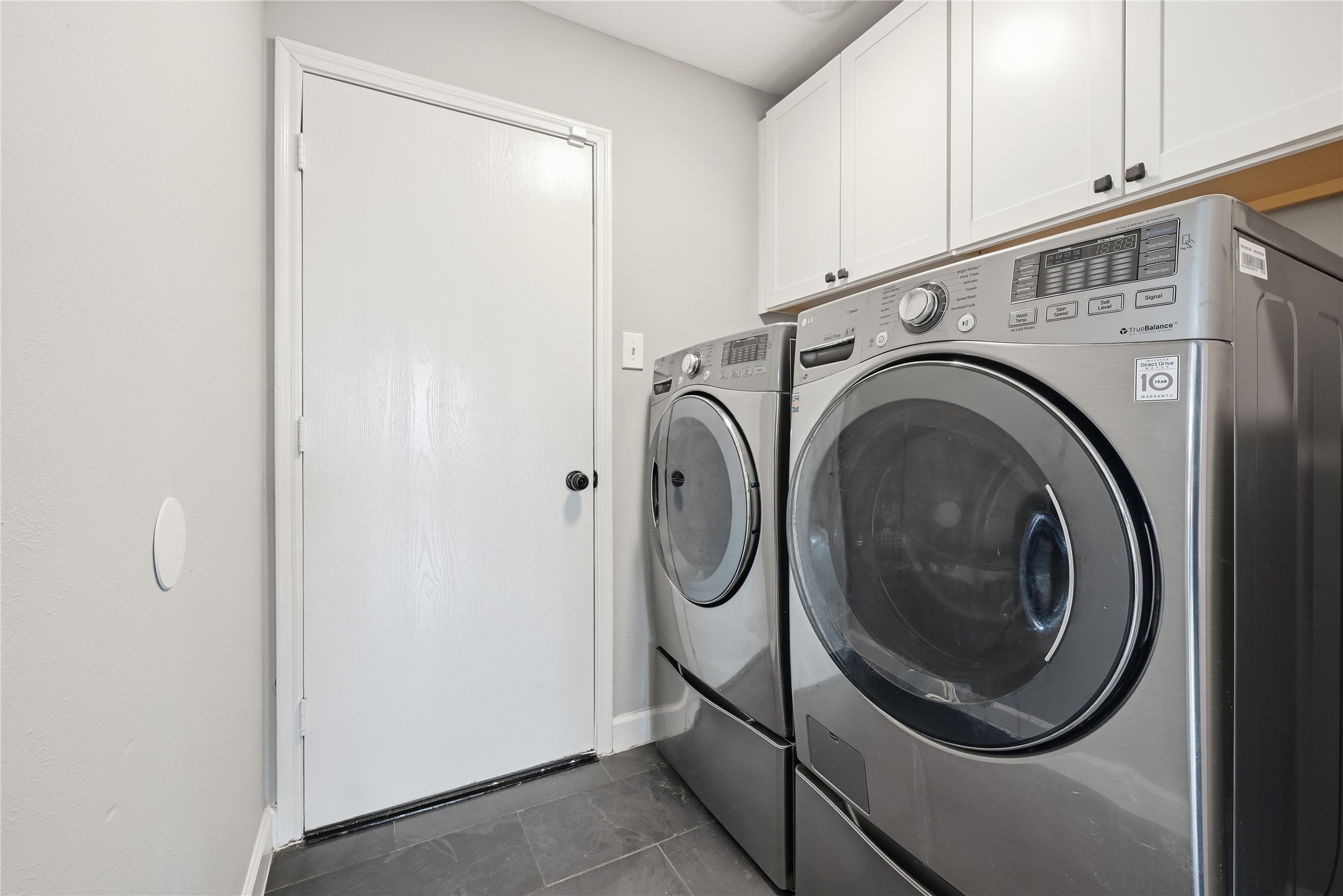 7218 Kransburg Ranch Drive Cypress, TX 77433 - Photo 25 of 27 a utility room with dryer and washer