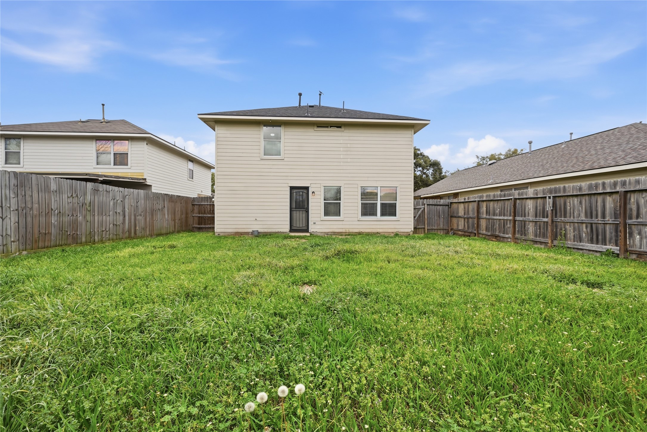 7218 Kransburg Ranch Drive Cypress, TX 77433 - Photo 27 of 27 a view of a house with a yard and sitting area