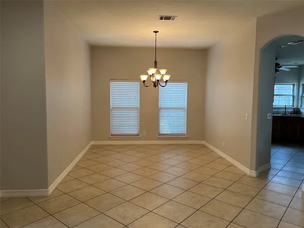 a kitchen with stainless steel appliances granite countertop a sink stove and microwave