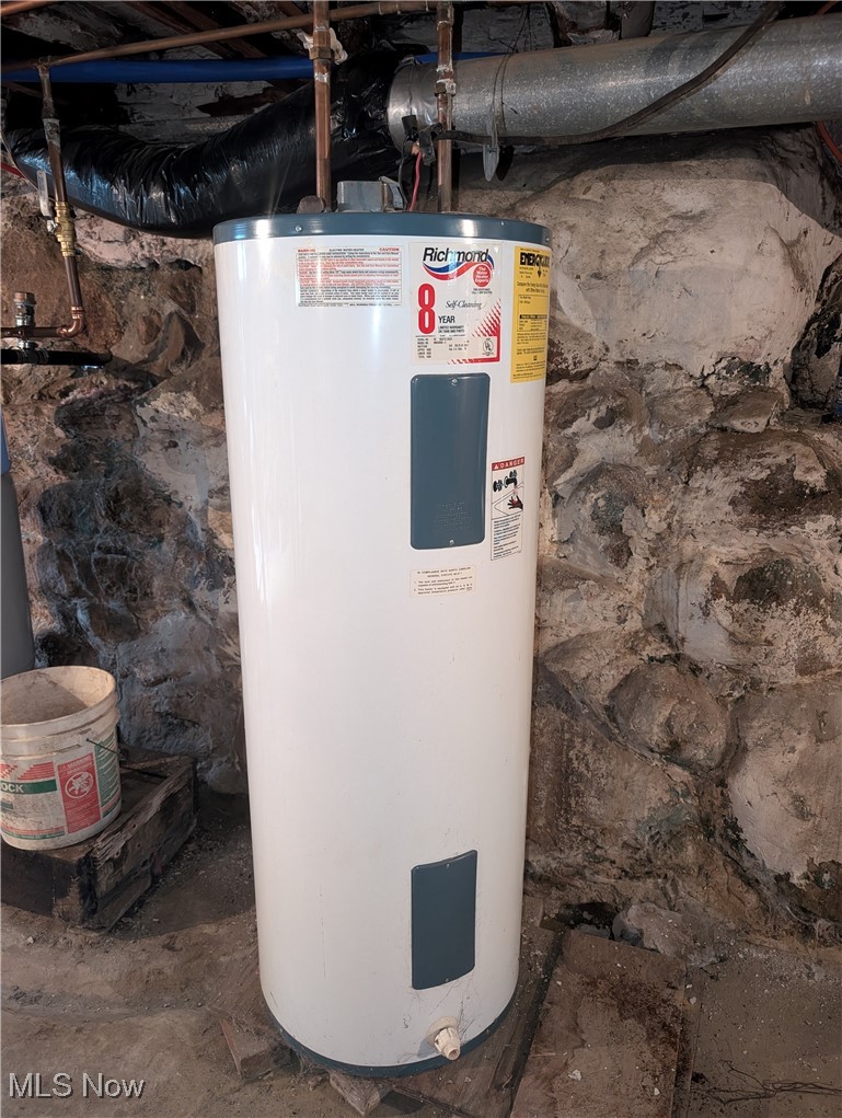 2356 Walter Main Road Geneva, OH 44041 - Photo 25 of 27 Utility room with water heater