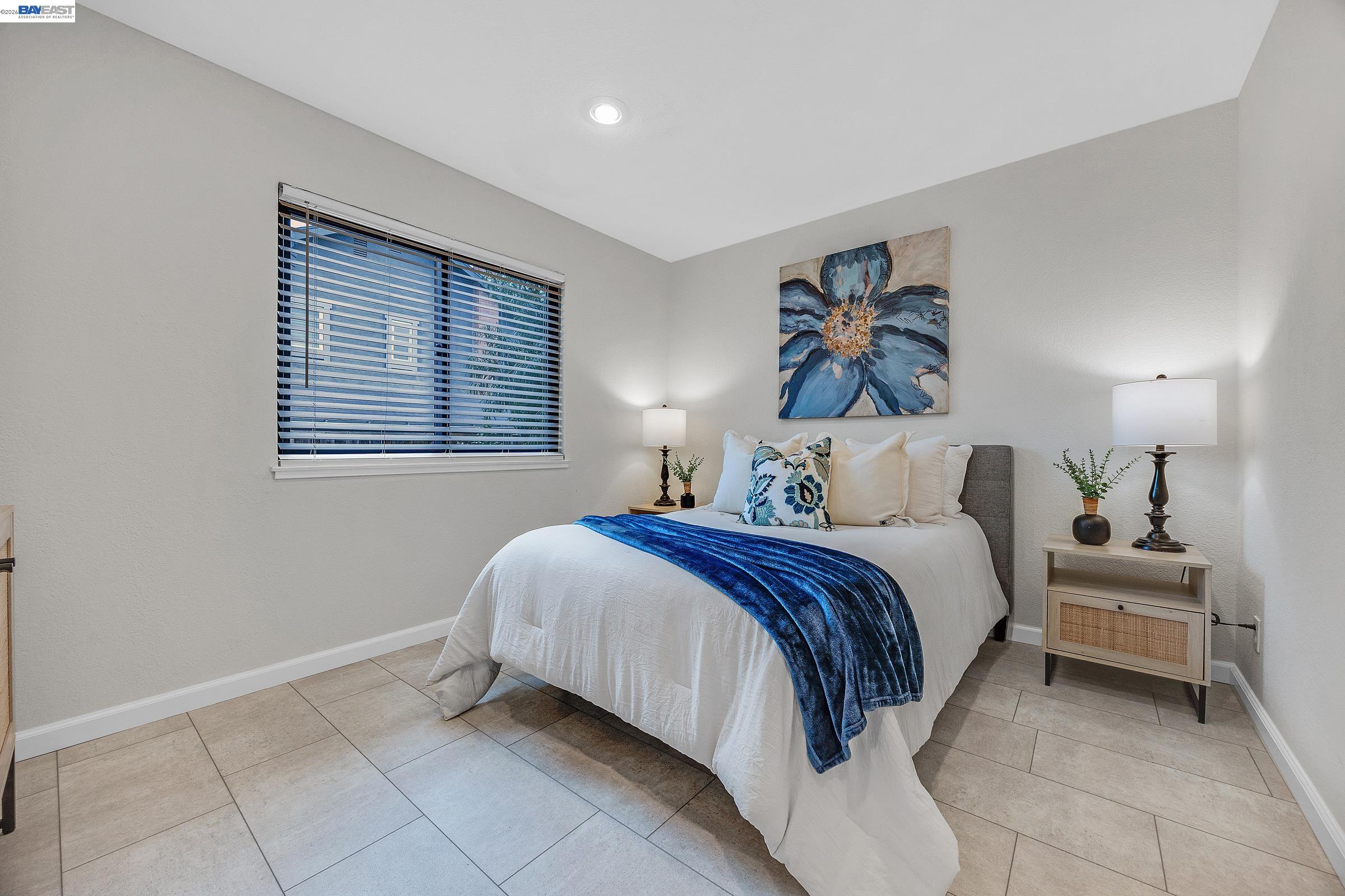 3020 Ascot Drive San Ramon, CA 94583 - Photo 20 of 45 a bedroom with a bed and a painting on the wall