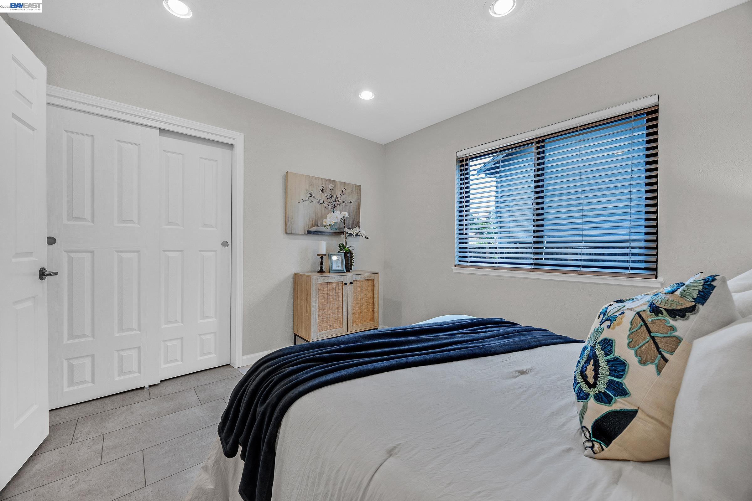 3020 Ascot Drive San Ramon, CA 94583 - Photo 21 of 45 a bedroom with a bed and a table