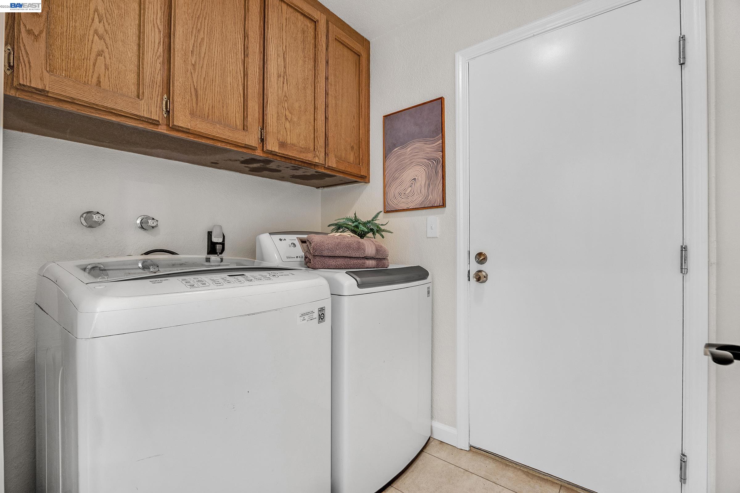 3020 Ascot Drive San Ramon, CA 94583 - Photo 23 of 45 a utility room with dryer and washer