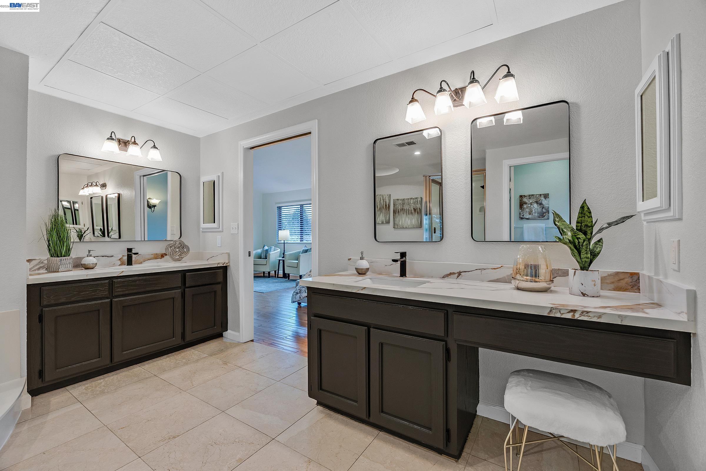3020 Ascot Drive San Ramon, CA 94583 - Photo 27 of 45 a spacious bathroom with a double vanity sink and a mirror