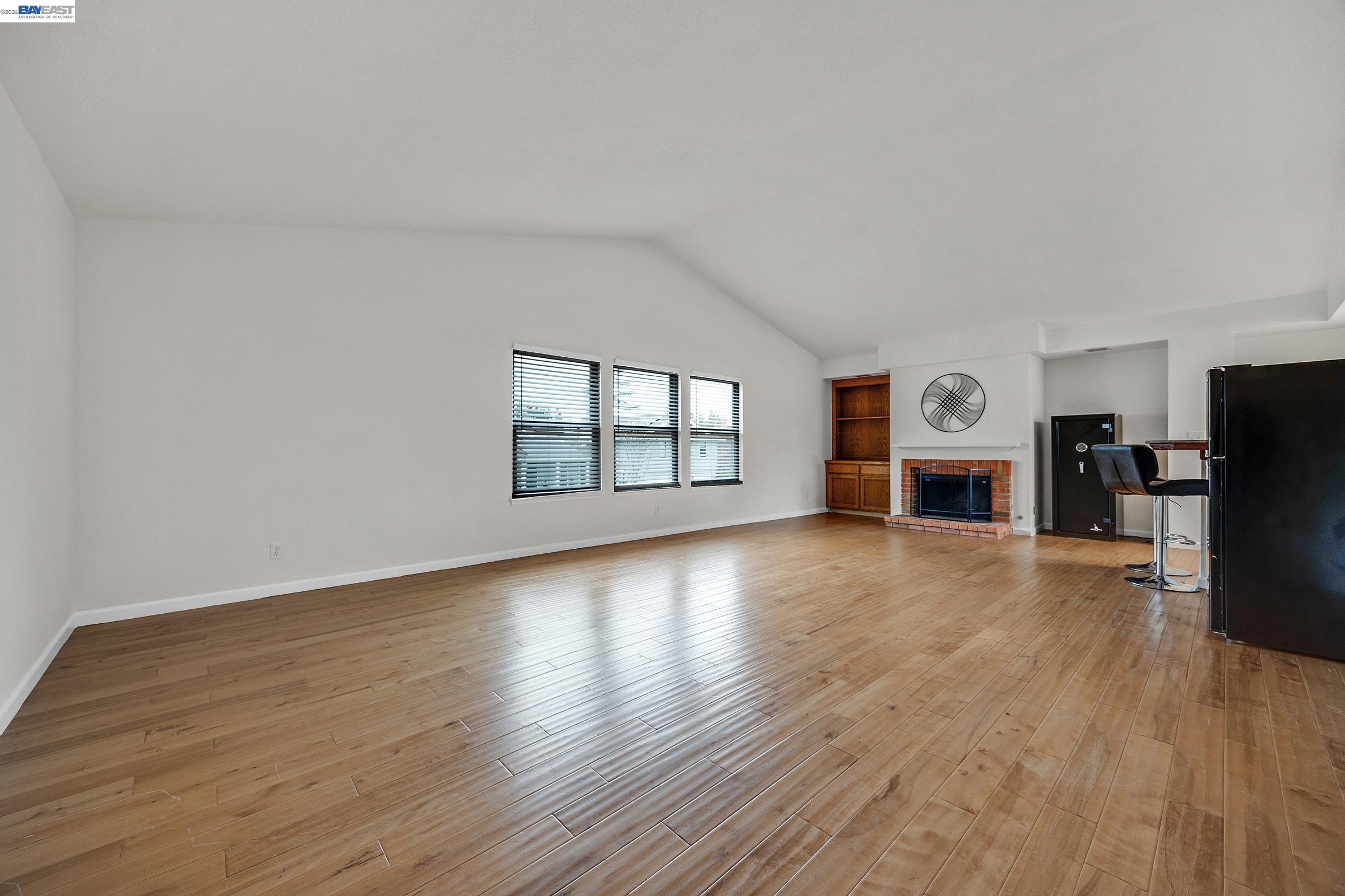 3020 Ascot Drive San Ramon, CA 94583 - Photo 30 of 45 a view of a livingroom with wooden floor and a fireplace