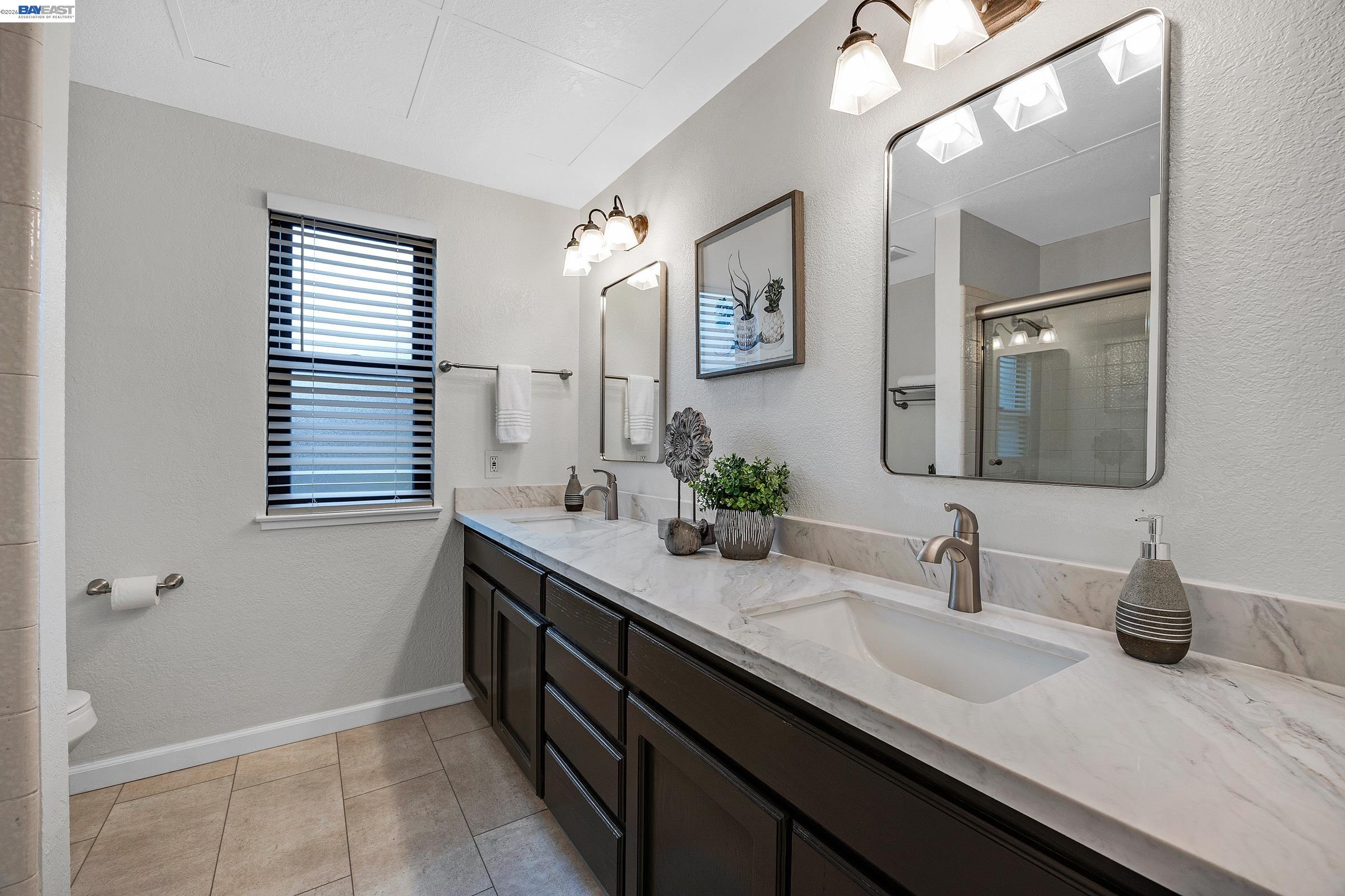 3020 Ascot Drive San Ramon, CA 94583 - Photo 35 of 45 a bathroom with a sink and a mirror