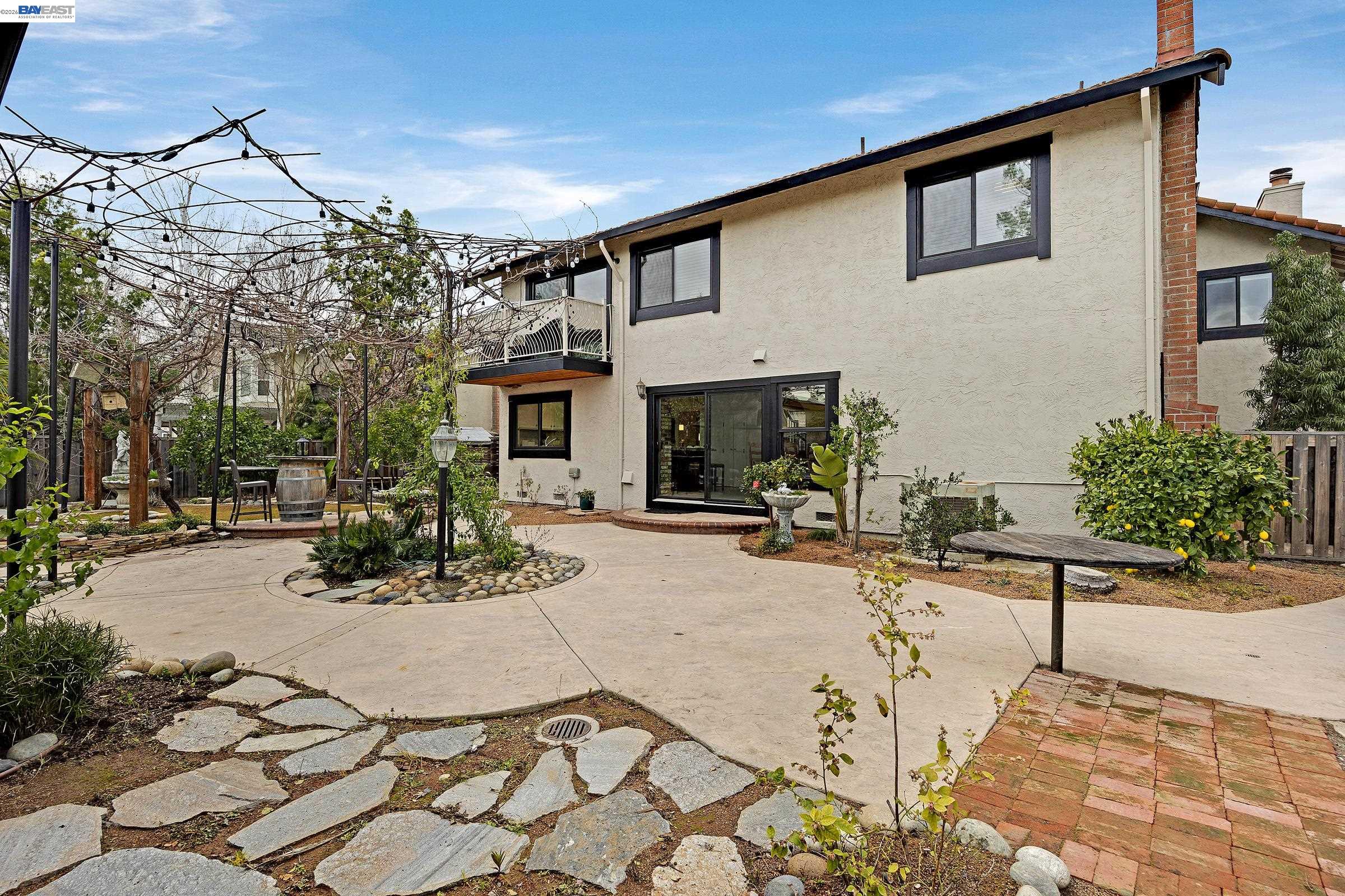3020 Ascot Drive San Ramon, CA 94583 - Photo 38 of 45 a view of a patio with table and chairs and potted plants
