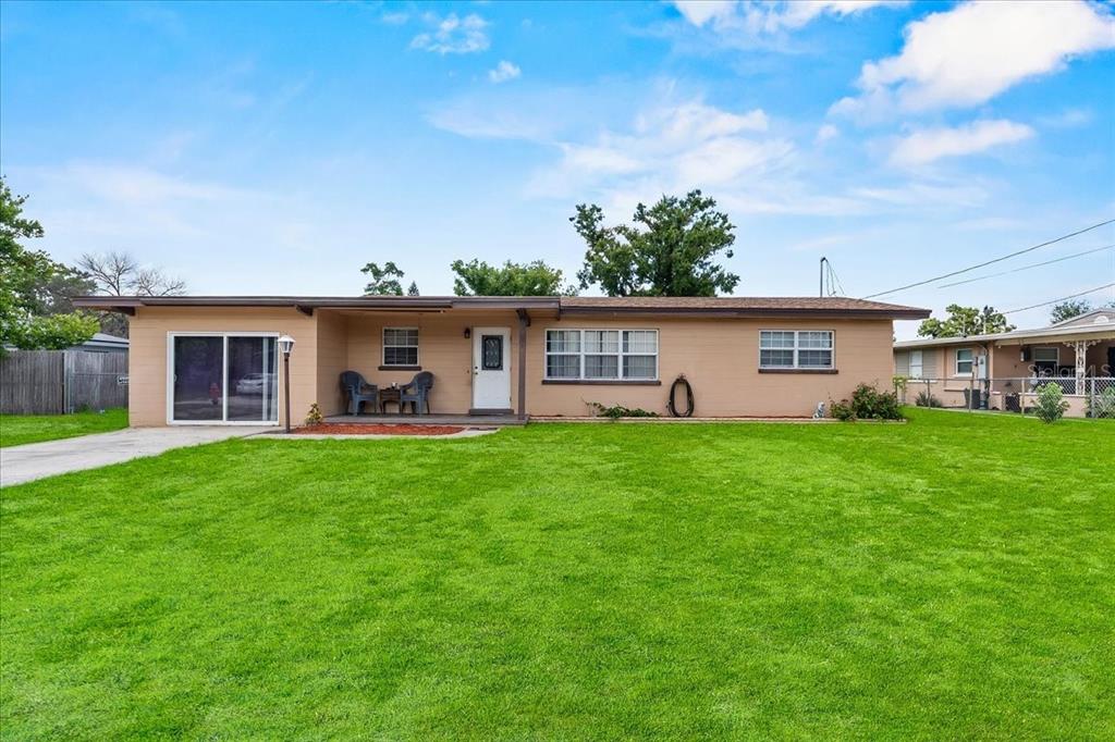 front view of a house with a yard